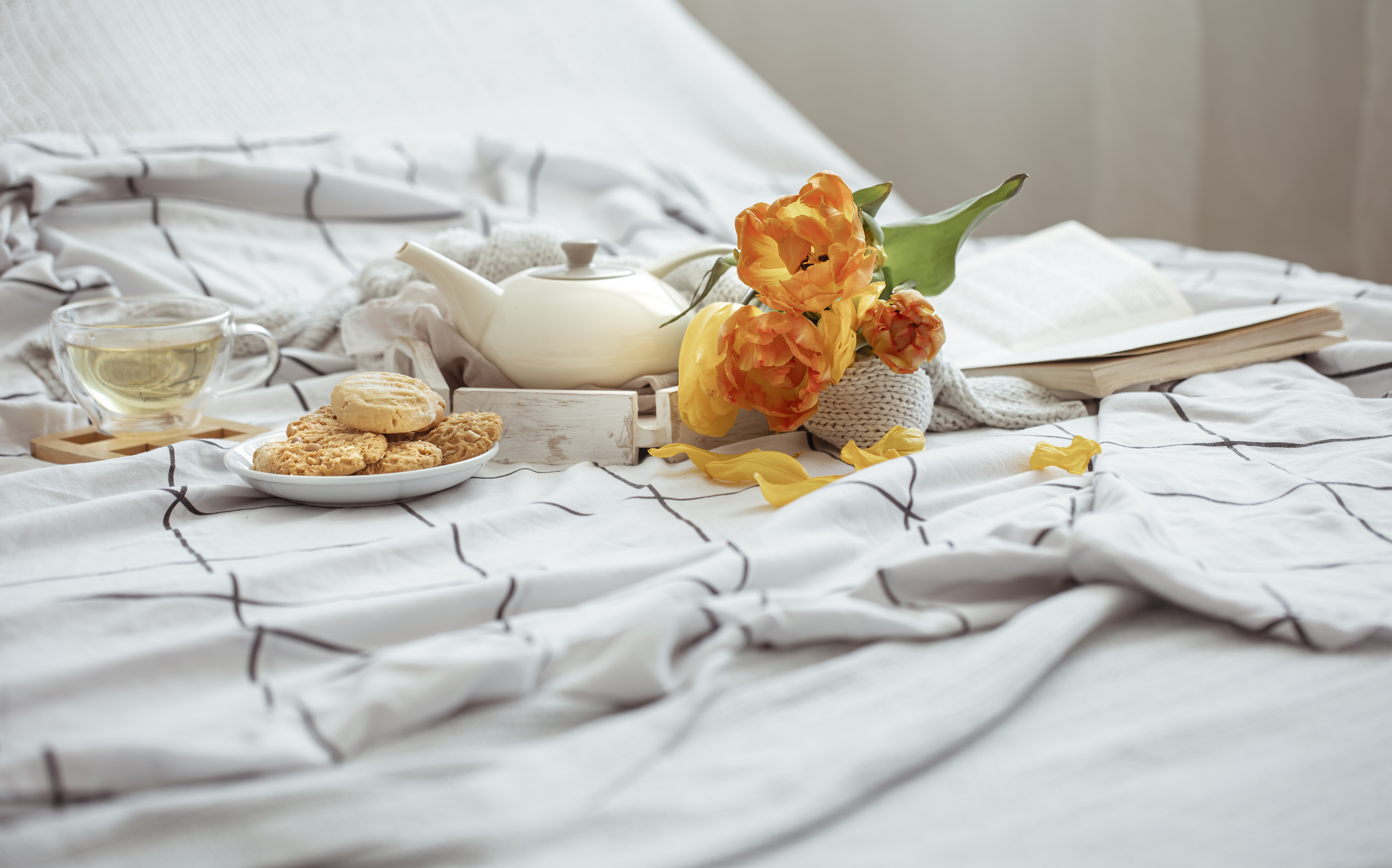 composition-with-cup-tea-teapot-bouquet-tulips-cookies-bed