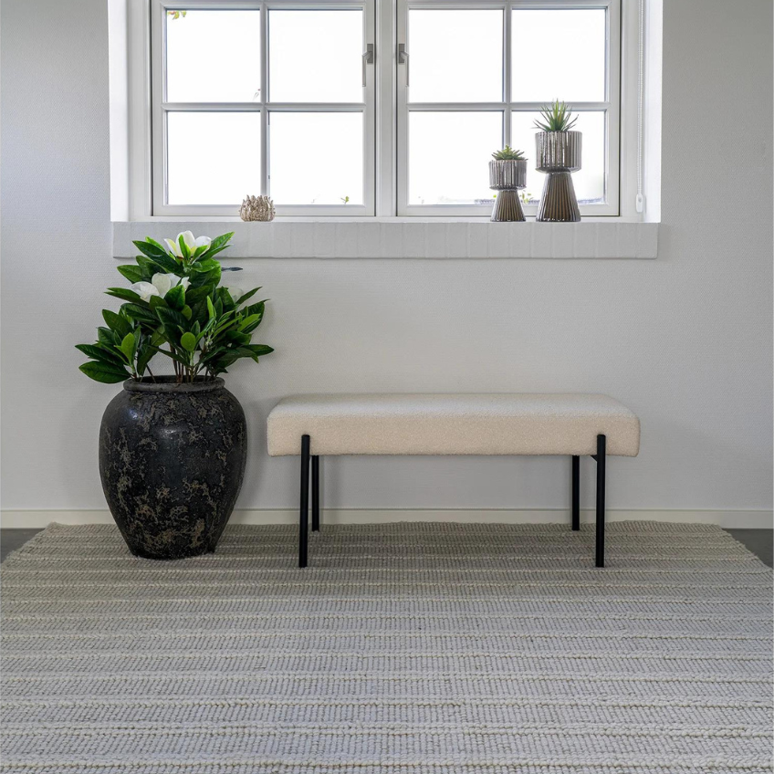 Nordic Living Krémově bílá bouclé lavice Swipper 100 cm