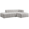 Světle šedá bouclé rohová pohovka Annecy 262 cm, pravá