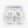 Kojenecké capáčky s mašličkou New Baby bílá 12-18 m (Barva Bílá, Velikost 12-18 m)