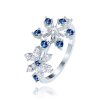 Stříbrný prsten sněhová vločka s modrými zirkony