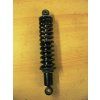 Shock absorber with spring