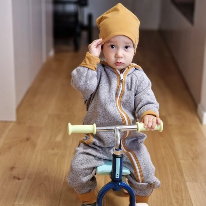 hrejivý fleecový overal pre deti mustard