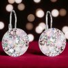 Strieborné dámske visiace náušnice vykladané krištálikmi Swarovski Crystals magic rose