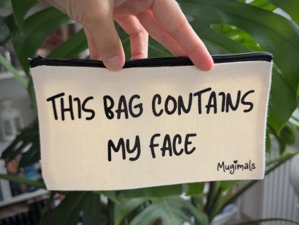 Kosmetická taštička „This bag contains my face“