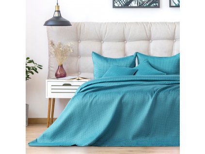 moderní přikrývka na postel carmen tyrkysová na posteli