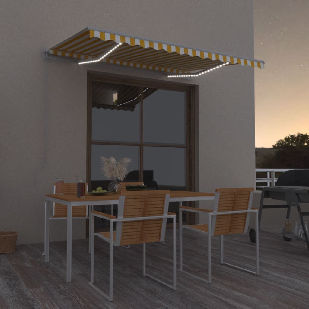 Levně vidaXL Ručně zatahovací markýza s LED světlem 350 x 250 cm žlutobílá