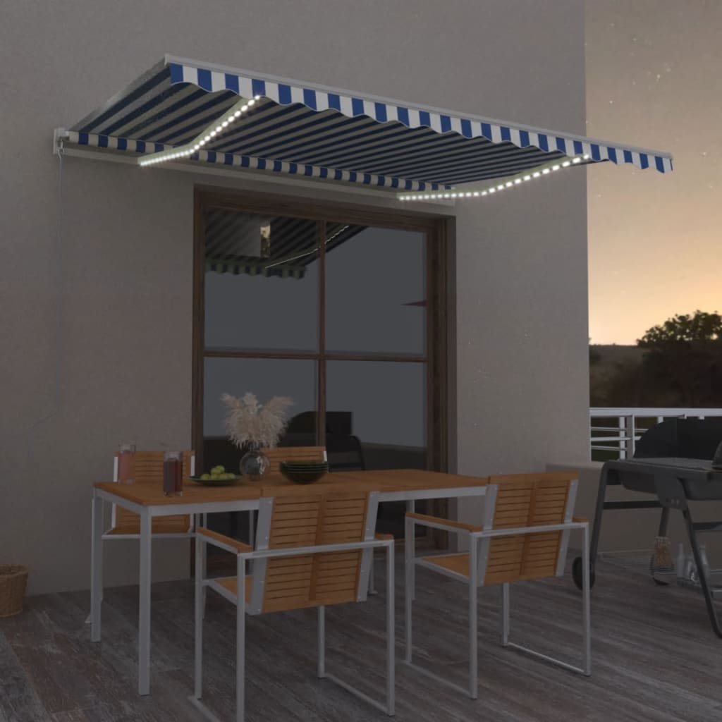Levně vidaXL Ručně zatahovací markýza s LED světlem 450 x 350 cm modrobílá