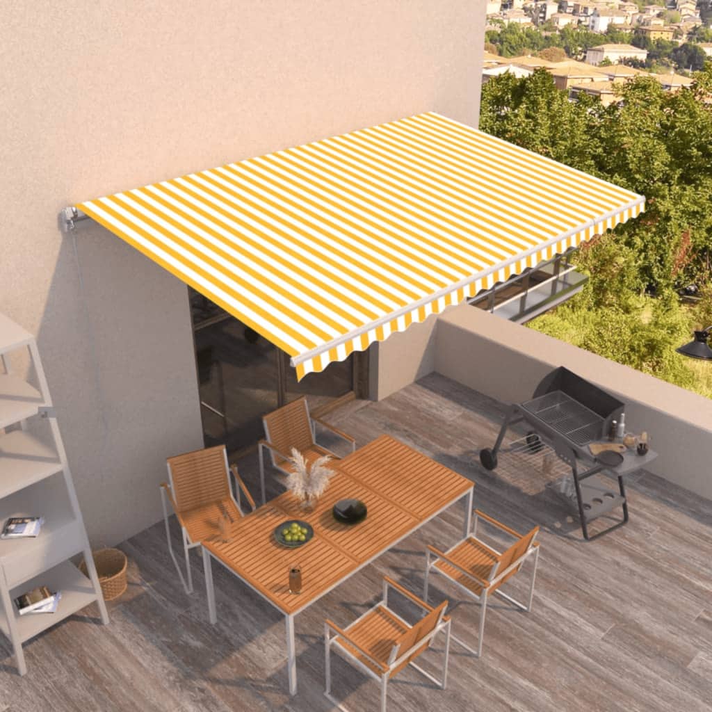 Levně vidaXL Ručně zatahovací markýza 500 x 350 cm žlutobílá