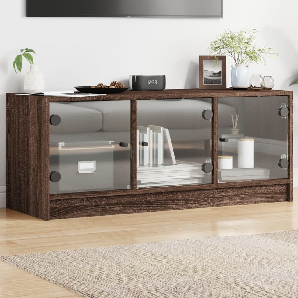 Levně vidaXL TV skříňka se skleněnými dvířky hnědý dub 102x37x42 cm