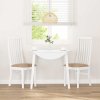 vidaXL Jídelní židle s polštáři 2 ks bílé masivní dřevo gumové