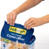 premium crystal litter 8lb bag fresh scent pd woman sealing bag 1504202506441442353