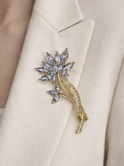 Brož zlatá KVĚTINA osázená světle modrými kamínky