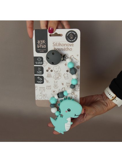 dino tyrkys klip v ruce