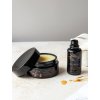Nunaia Beauty Ground & Glow Ritual Set Lifestyle image with open bottle and jar ©2023