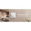 AQARA Dimmer Switch H2 EU nainstalovaný na stěně v interiéru.