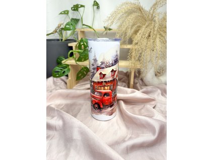 termohrnek s domem a autem v zimní krajině