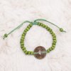 Zelený dřevěný náramek s čínskou mincí štěstí
