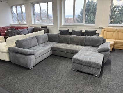 Sedací souprava do tvaru U, rozkládací, nepoužitá.