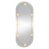 Nástěnné zrcadlo s LED osvětlením 25 x 60 cm sklo oválné 3189160