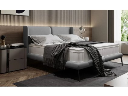 Postel RONALD v interiéru ložnice, celkový pohled z mírného úhlu, světle šedé čalounění, černé nohy