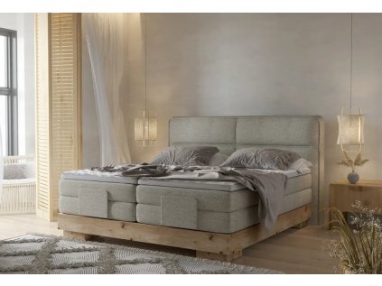 Boxspring postel RAVEN v interiéru ložnice, celkový pohled z mírného úhlu, světle šedé čalounění, dřevěná základna