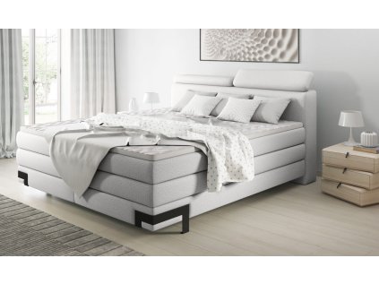 Boxspring postel PATRICIA v interiéru ložnice, celkový pohled z mírného úhlu, světle šedé čalounění