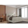 Boxspring postel SNUGGLE v interiéru ložnice, celkový pohled z mírného úhlu, světle béžové čalounění