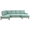Rohová sedací souprava OSLO ve světle zelené látce sestavená do delší linie s rohovým dílem, pohled zepředu.