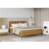 Boxspring postel ARES v moderní ložnici – čalouněné čelo a hnědý korpus