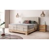 Boxspring postel SANDRA v interiéru ložnice, celkový pohled z mírného úhlu, béžové čalounění, dřevěná základna