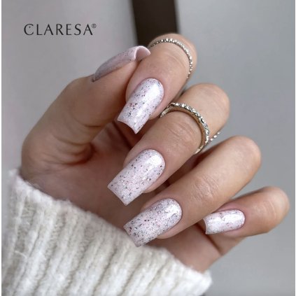 CLARESA TOP NO WIPE ICE DISCO 5G Transparentný top s kúskami striebornej fólie vytvára efekt ľadových odleskov a dodáva manikúre žiarivý, elegantný vzhľad. Bez výpotku, so stredne hustou konzistenciou pre jednoduchú aplikáciu.