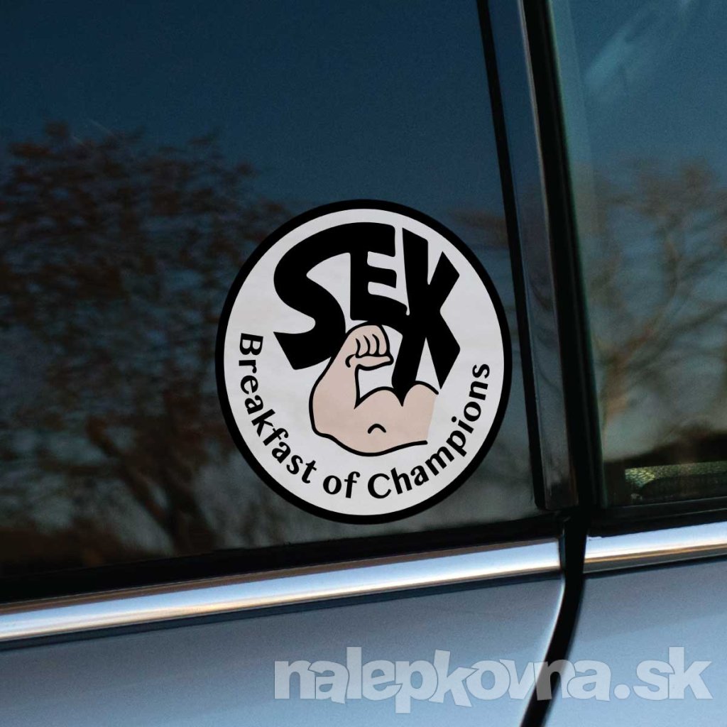 Tlačená nálepka s kruhovým motívom, textom „SEX – Breakfast of Champions“ a ilustráciou ohnutého bicepsu v strede.