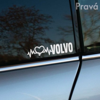 Na obrázku je biela nálepka na čiernom okne automobilu značky Volvo, umiestnená na pravej strane zadného bočného okna. Nálepka obsahuje grafiku srdca prepojeného s kardiografickou krivkou a nápisom "Volvo". Táto nálepka je ideálna pre milovníkov áut Volvo, ktorí chcú zvýrazniť svoju lásku k tejto značke. Skvelá voľba pre personalizáciu a pridanie štýlového prvku na vaše vozidlo Volvo, dodáva mu osobitý a atraktívny vzhľad.