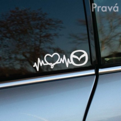 Na fotografii je detailný záber na bočné okno auta Mazda, na ktorom je biela nálepka s motívom srdca a EKG vlny. Nálepka kombinuje symbol lásky k autám s logom Mazdy, čím vytvára štýlový a originálny doplnok pre vozidlo. Tento typ nálepky je ideálny pre majiteľov Mazdy, ktorí chcú prejaviť svoju vášeň pre túto značku. Výborný doplnok pre milovníkov áut a tuningových nadšencov.