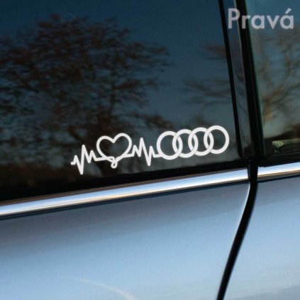 Plotrovaná nálepka s motívom EKG línie, ktorá prechádza do tvaru srdca a štyroch kruhov Audi, symbolizujúca vášeň pre značku.