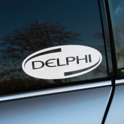 Elegantná nálepka „Delphi“ s oválnym dizajnom na okne auta reprezentuje renomovanú značku zameranú na kvalitné automobilové komponenty a technológie. Kombinácia bieleho podkladu s čiernym textom vytvára moderný kontrast, ktorý vyniká na tmavom skle. Ideálna voľba pre motoristov a tuningových nadšencov, ktorí oceňujú spoľahlivosť a prémiový vzhľad svojho vozidla.  **Kľúčové slová:** nálepka na auto, Delphi nálepka, kvalitné autodiely, automobilová technológia, tuningové doplnky, štýlové nálepky na okno, personalizácia auta, spoľahlivé príslušenstvo pre autá.