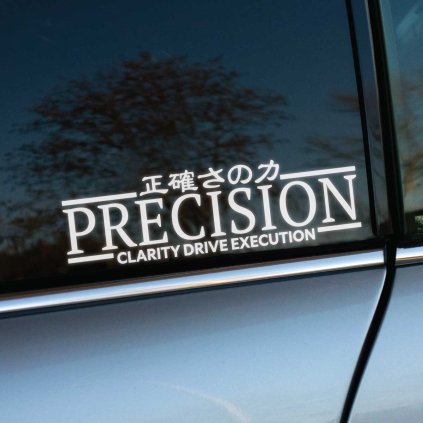 Plotrovaná nálepka „PRECISION“ s japonským textom a sloganom „CLARITY DRIVE EXECUTION“. Motivačná nálepka na auto pre milovníkov presnosti a výkonu.