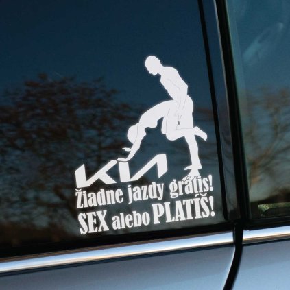 Plotrovaná nálepka s novým logom Kia, doplnená o siluety postáv v sugestívnej póze a provokatívnym textom. Humorný autodoplnok.