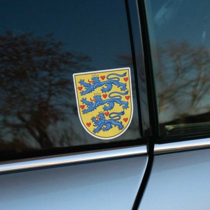 Tlačená nálepka na auto s historickým erbom Dánska, troch modrých levov a červených sŕdc na žltom štíte.