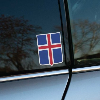 Tlačená nálepka na auto so štátnym erbom Islandu, červený kríž s bielym lemom na modrom štíte so špicom dole.