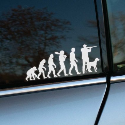 Plotrovaná nálepka s evolučnou siluetou vrcholiacou poľovníkom so zbraňou a psom ako dynamický motív pre milovníkov lovu.