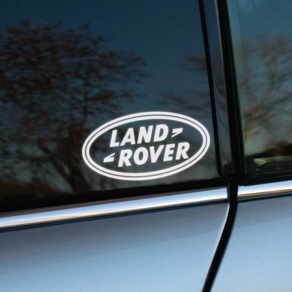 Plotrovaná nálepka s elipsovým logom, v ktorom sa nachádza text v presnom znení nápisu s obsahom LAND ROVER.