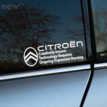 Plotrovaná nálepka s logom Citroën v ovále a akronymom CITROËN – Creatively Insane Technology Requires Ongoing Expensive Nursing.