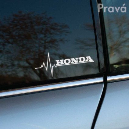 Nálepka na auto s logom Honda a motívom EKG línie na bočnom okne šedého auta Honda. Táto atraktívna a štýlová nálepka je ideálnym doplnkom pre každého nadšenca značky Honda, dodáva autu osobitý vzhľad a zvýrazňuje jeho charakter. Perfektná voľba pre individualizáciu vozidla.