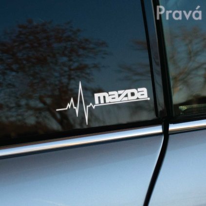 Štýlová nálepka Mazda s EKG motívom na bočnom okne šedého auta Mazda. Tento dizajnový prvok dodáva vozidlu moderný a dynamický vzhľad, ideálny pre všetkých nadšencov značky Mazda, ktorí chcú svojmu autu dodať osobitosť a charakter. Skvelý spôsob, ako personalizovať svoje auto a zvýrazniť svoju vášeň pre značku Mazda.