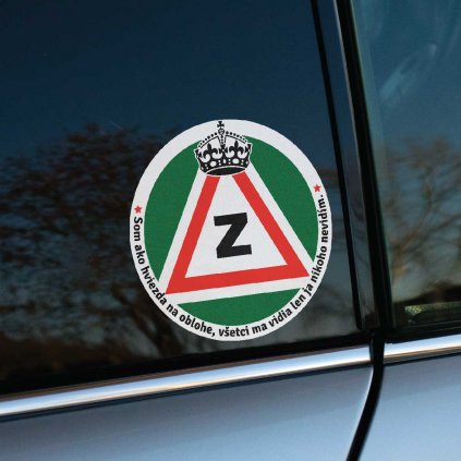 Tlačená nálepka so symbolom začiatočníka „Z“ v trojuholníku, korunou a humorným textom: „Som ako hviezda na oblohe, všetci ma vidia, len ja nikoho nevidím.“