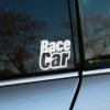 Plotrovaná nálepka RaceCar s mohutnou typografiou a silným kontrastom, výborný štýlový doplnok na tuning vozidlá.