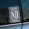 Plotrovaná nálepka s logom NARDI ND TORINO v obdĺžniku s vnútorným rámom a výrazným stredovým písmom.