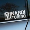 Plotrovaná nálepka s logom ND NARDI TORINO, kde je ND v ráme a nápisy zoradené v dvoch riadkoch.